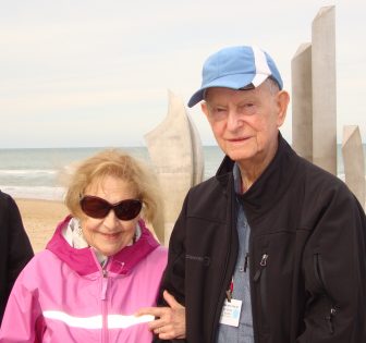 older man and woman smiling in picture
