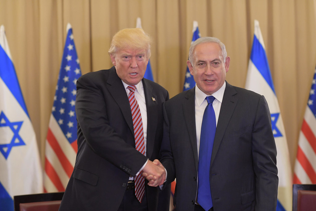 Trump and Netanyahu shaking hands in Israel